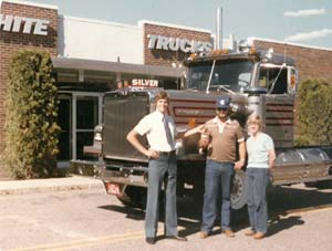 Bernie Betke handing the keys to a 1980 Western Star to Denny Olson outside the White Western Star plant in Kelowna, B.C.