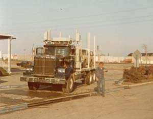 The first Western Star log truck in Michigan, about 1980. Though spec’d to haul logs, this picture shows it’s perfectly capable of carrying pickup trucks as well.